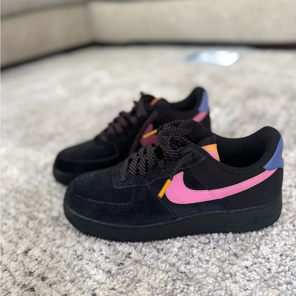 Black Sneakers with Pink and Yellow Accents